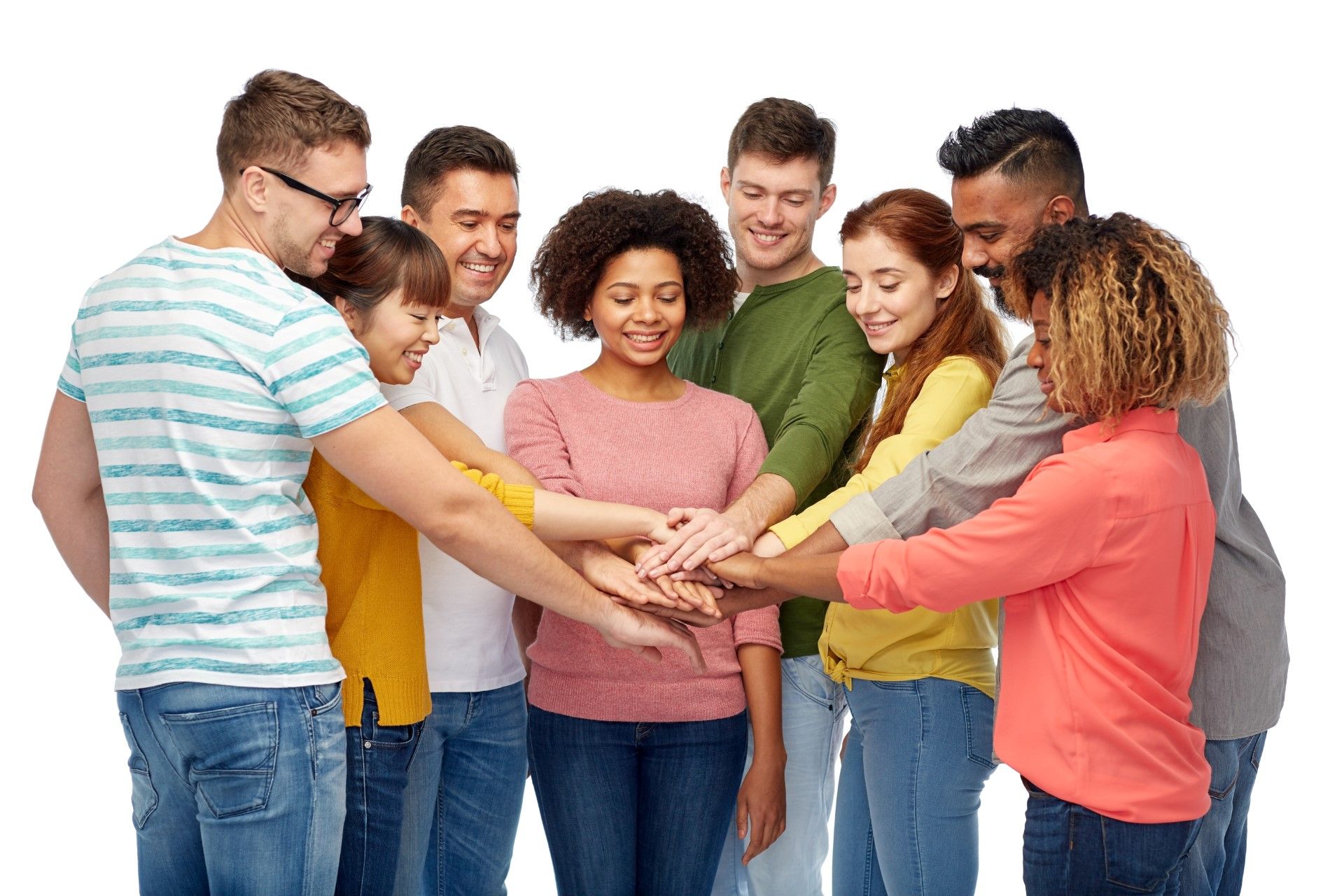 a group of young people hands on hands